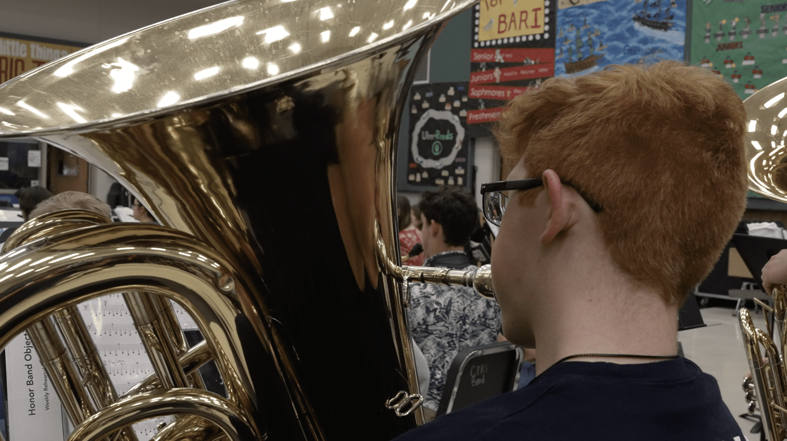 Student playing an instrument