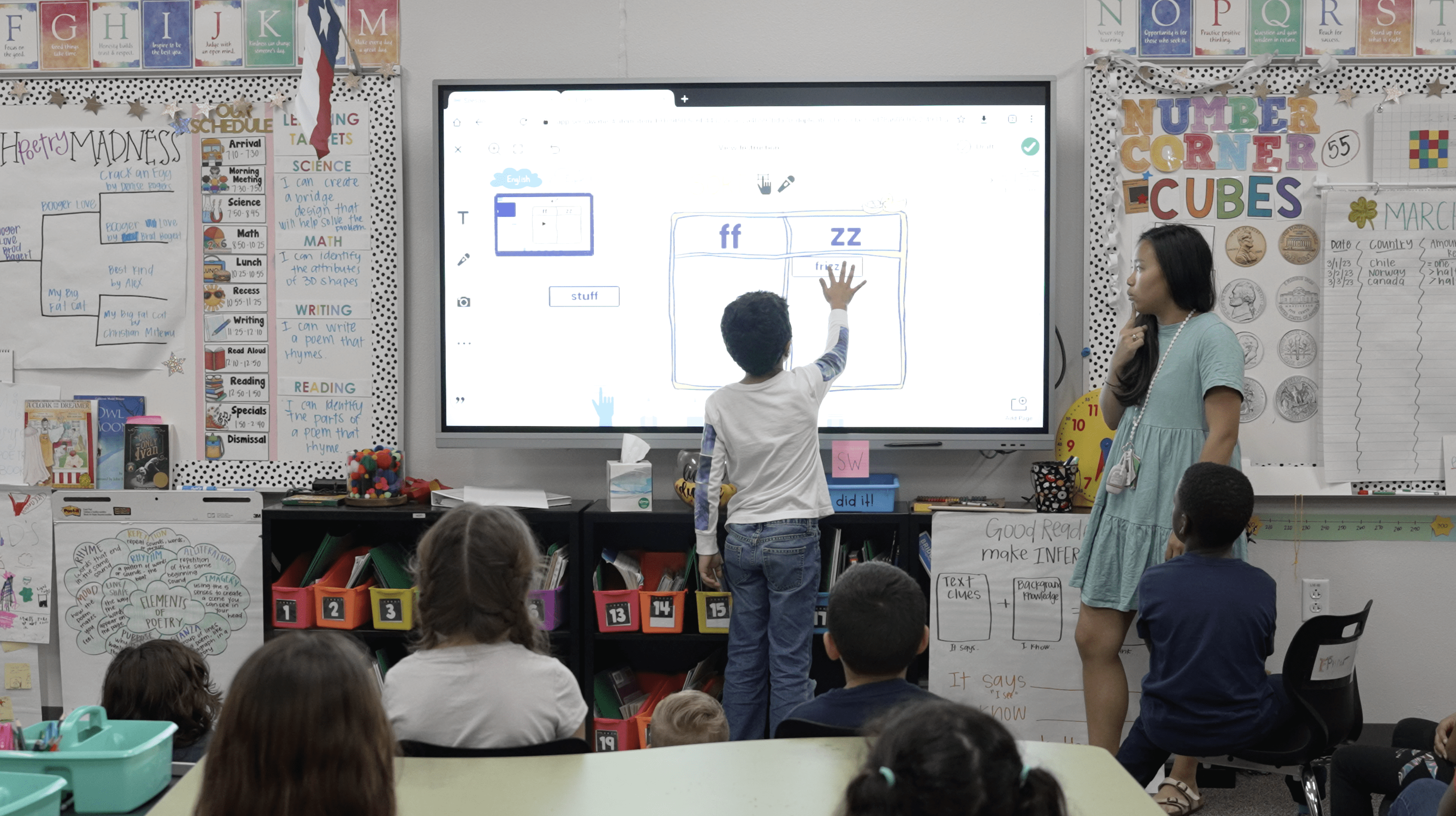 Technology student using an interactive panel