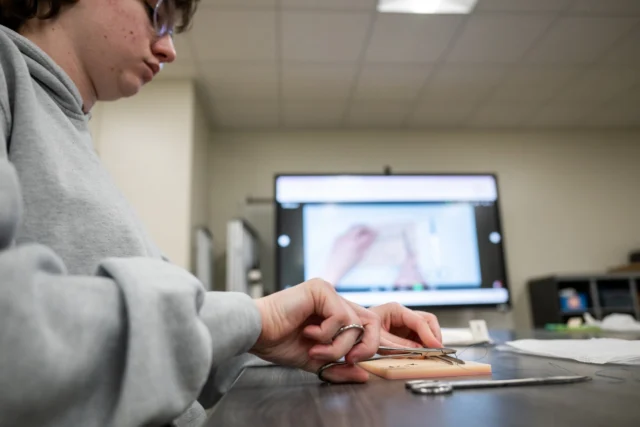 Stitch by stitch, building future careers — starting in high school. 🪡🩺 Health science practicum in action.

#1LISD